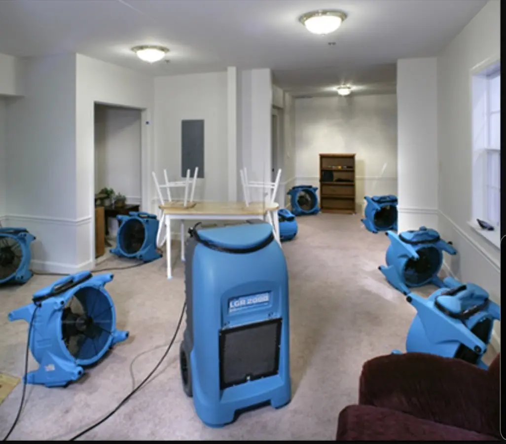 Air movers and dehumidifier setup for Water Damage Restoration in Hawthorne